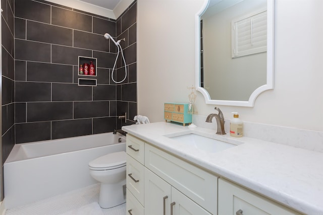 full bathroom featuring tile patterned flooring, tiled shower / bath combo, toilet, and vanity