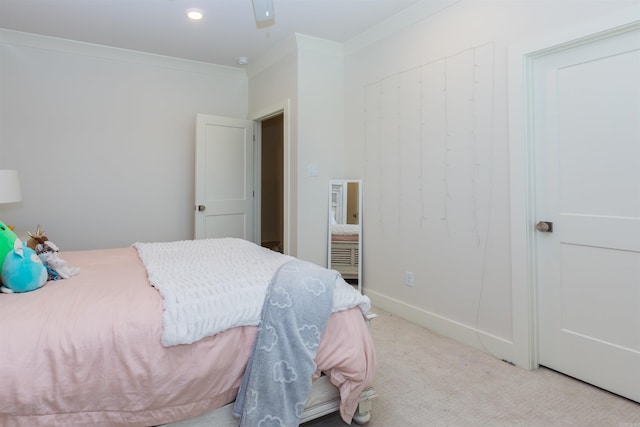 bedroom featuring light carpet, ceiling fan, and ornamental molding