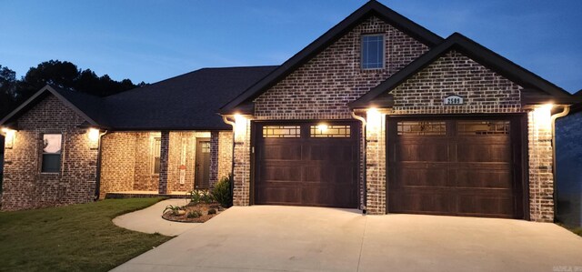 view of front of home with a garage