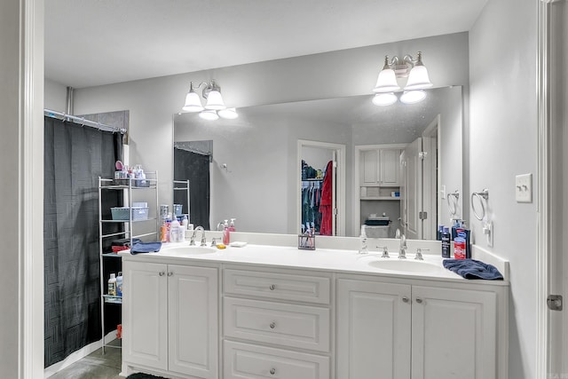 bathroom with a shower with curtain and vanity