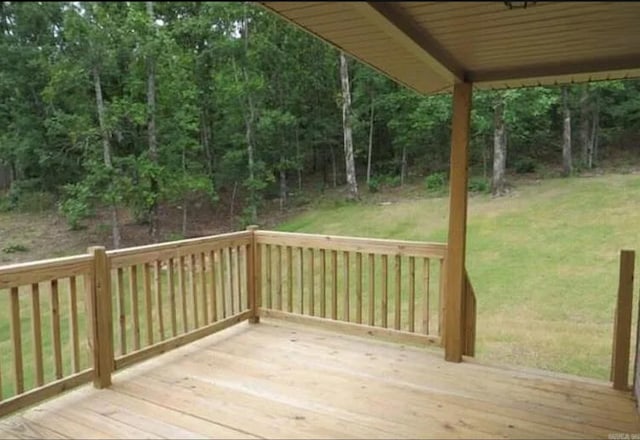 deck featuring a yard