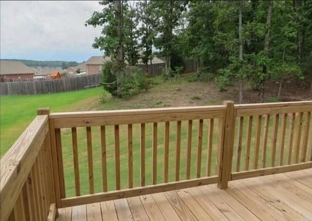 deck featuring a yard