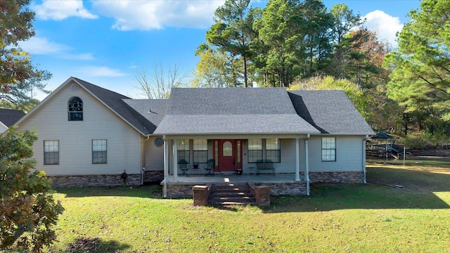 view of front of house featuring covered porch and a front yard