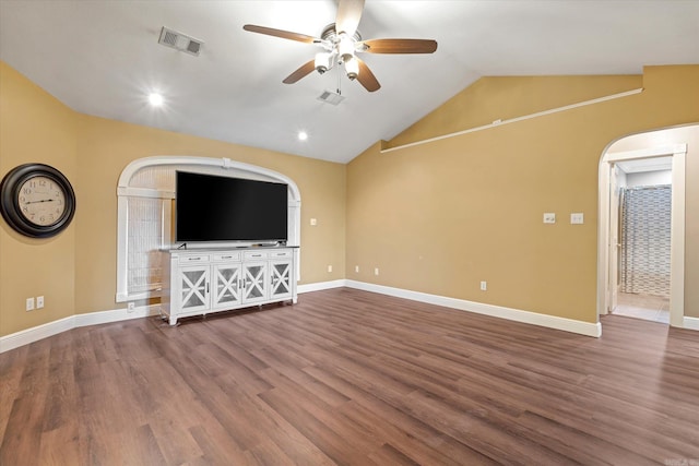 unfurnished living room featuring hardwood / wood-style flooring, ceiling fan, and vaulted ceiling