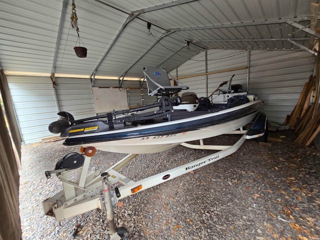 garage featuring a carport