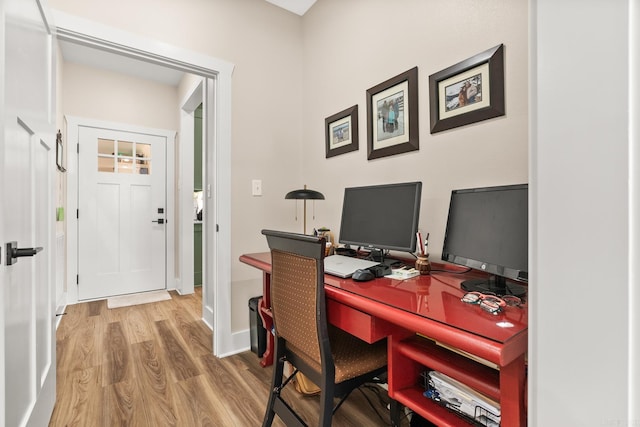 office area with hardwood / wood-style floors