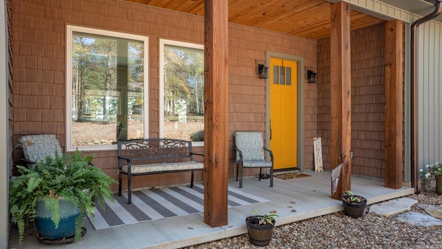 doorway to property featuring a porch