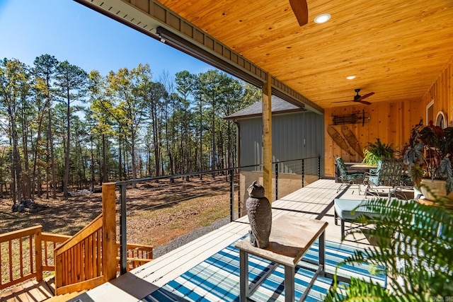 deck with a patio area and ceiling fan