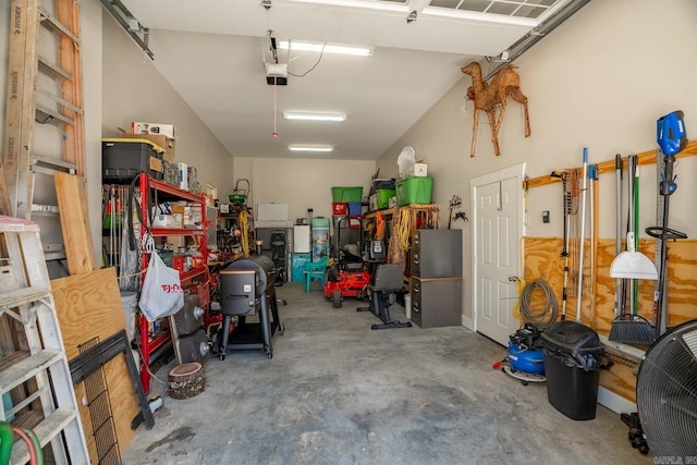 garage featuring a garage door opener