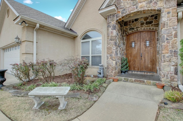 property entrance featuring a garage