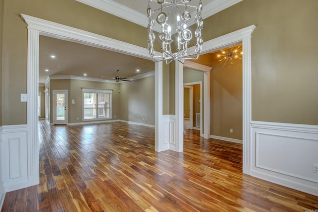 unfurnished dining area with hardwood / wood-style flooring and crown molding