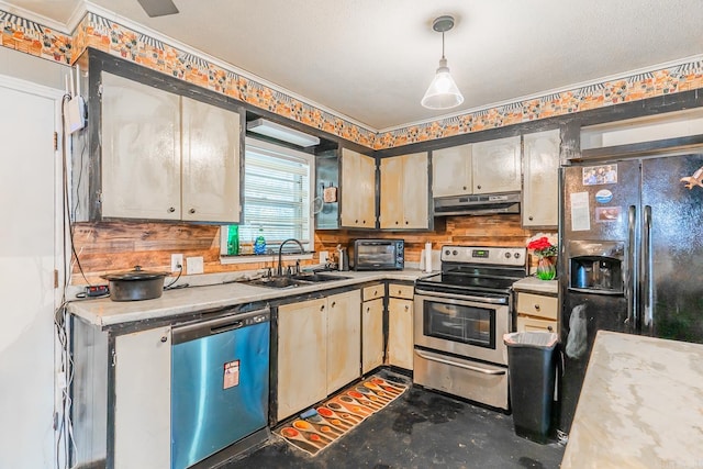 kitchen with sink, decorative backsplash, ornamental molding, appliances with stainless steel finishes, and decorative light fixtures