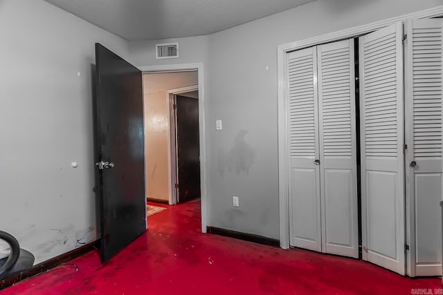 bedroom featuring a textured ceiling