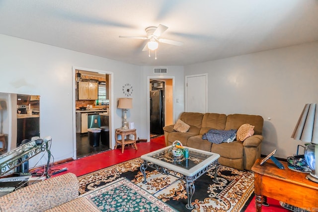 living room with ceiling fan