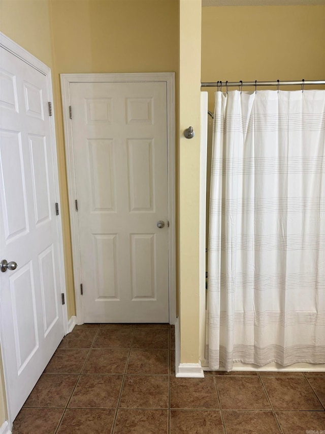 bathroom featuring tile patterned flooring