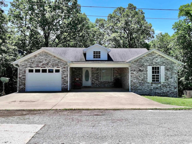 view of front of property featuring a garage