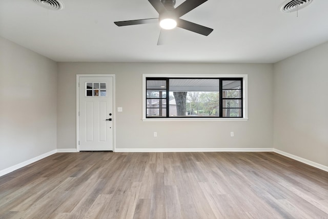 foyer entrance featuring ceiling fan and light hardwood / wood-style floors