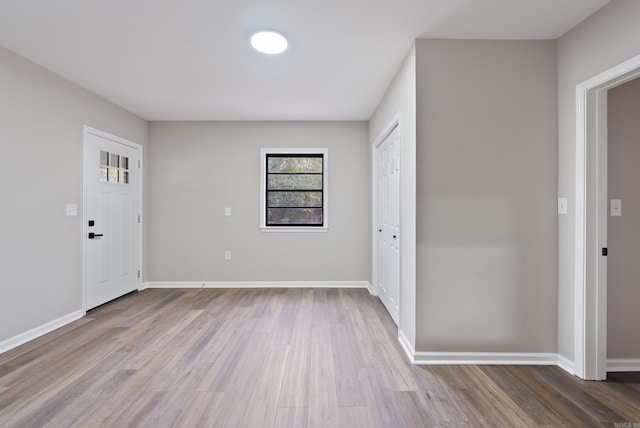 entrance foyer with light hardwood / wood-style flooring