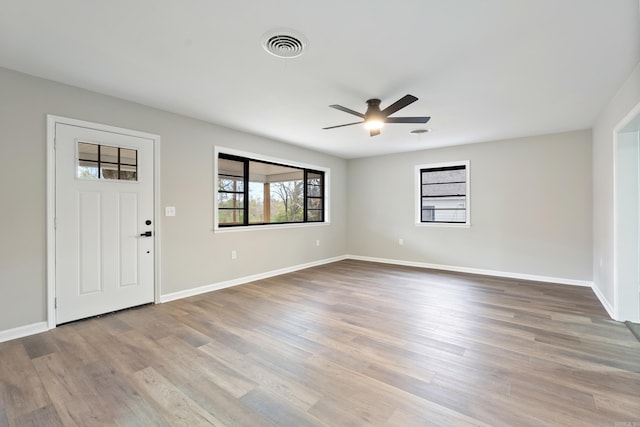 entryway featuring ceiling fan and hardwood / wood-style flooring