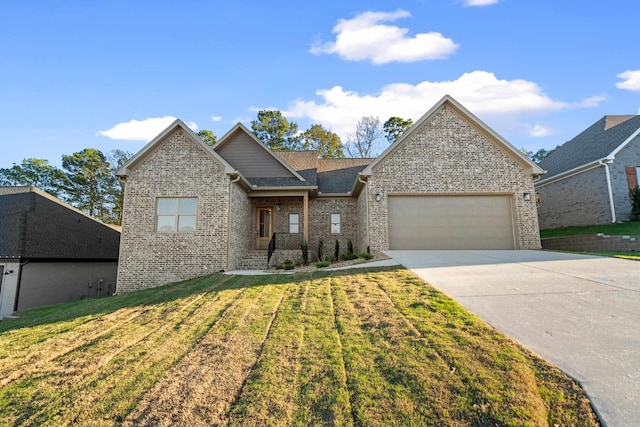 view of front of property featuring a garage and a front lawn