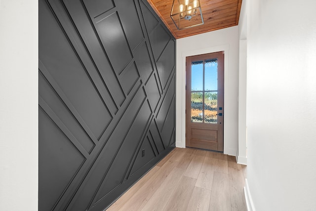 entryway featuring wooden ceiling and light wood-type flooring