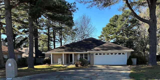 ranch-style home featuring a garage