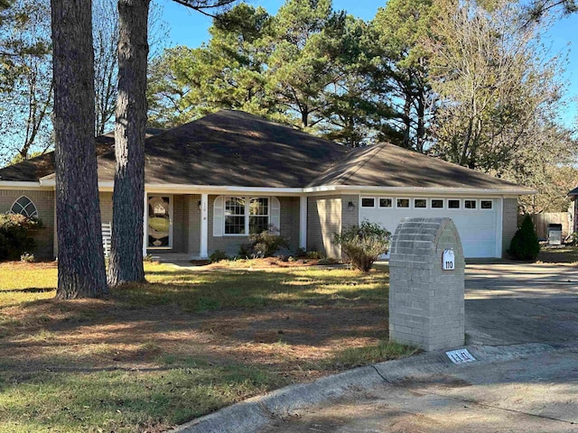 ranch-style home with a garage