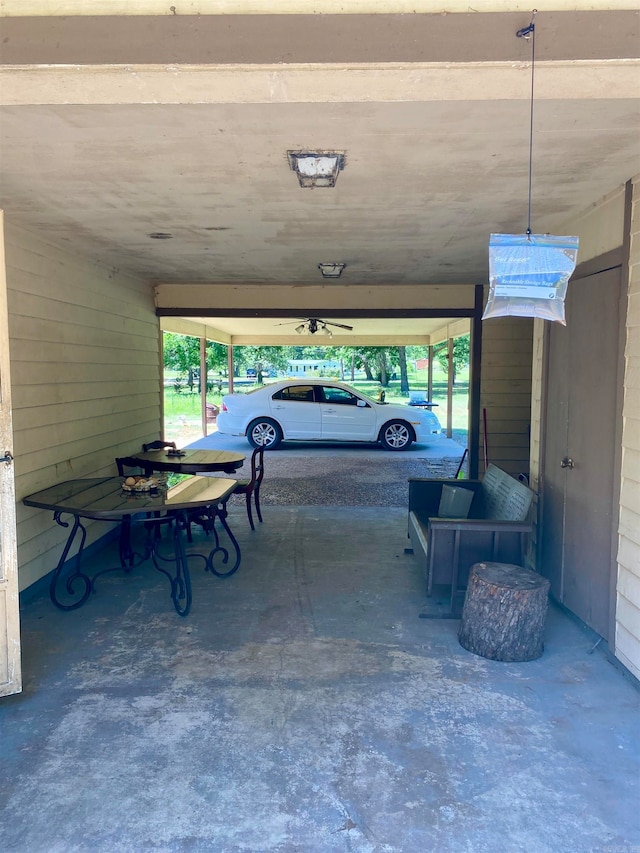 garage featuring a carport