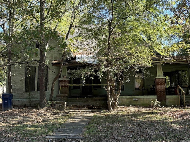 121 NW Cleveland Ave, Camden, AR 71701 - rear view of property featuring covered porch