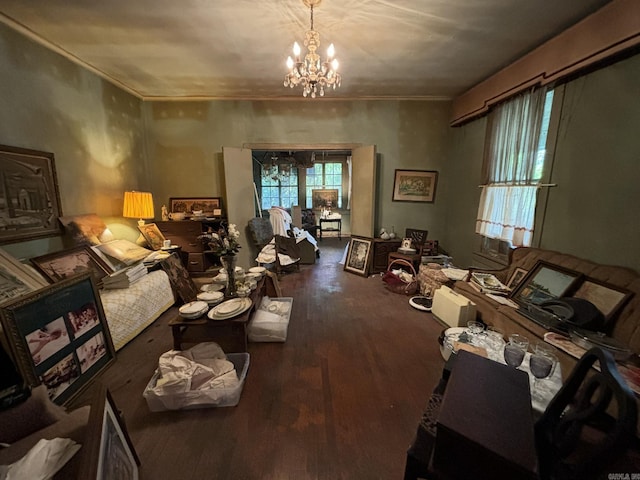 121 NW Cleveland Ave, Camden, AR 71701 - living area featuring a chandelier, wood finished floors, and crown molding