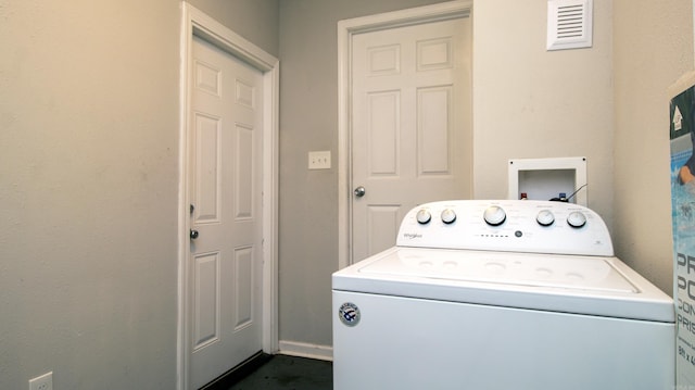 laundry area with washer / dryer