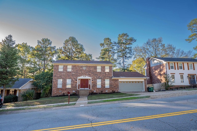 colonial inspired home with a garage