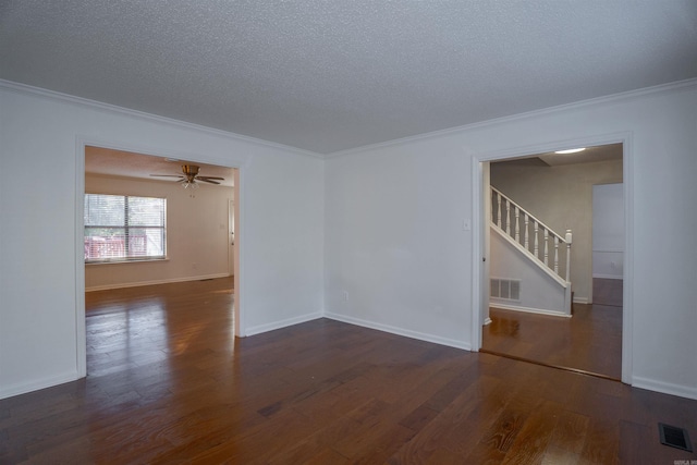125 Pebble Beach Dr, Little Rock, AR 72212 - empty room featuring ornamental molding, stairway, wood finished floors, a textured ceiling, and baseboards