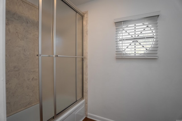 125 Pebble Beach Dr, Little Rock, AR 72212 - full bathroom featuring shower / bath combination with glass door and baseboards