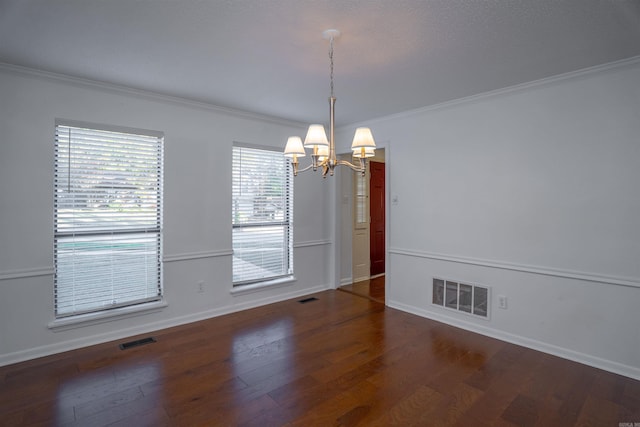 unfurnished dining area featuring a notable chandelier, dark hardwood / wood-style floors, and ornamental molding