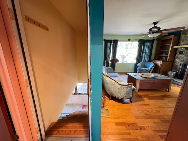 interior space featuring ceiling fan and light hardwood / wood-style flooring