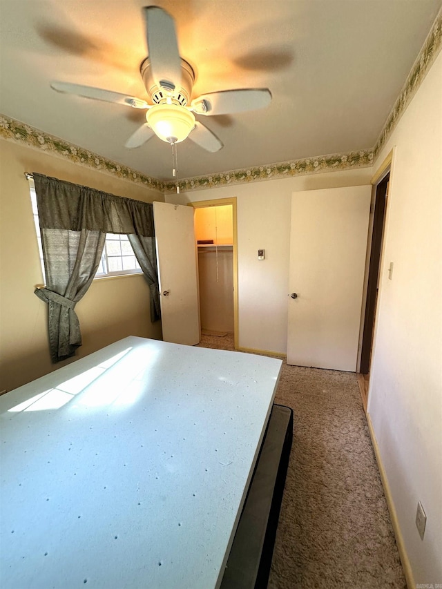 1107 Glenaire St, Mena, AR 71953 - unfurnished bedroom with a closet and a ceiling fan