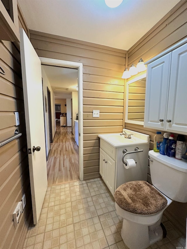 1107 Glenaire St, Mena, AR 71953 - half bath with vanity and wooden walls