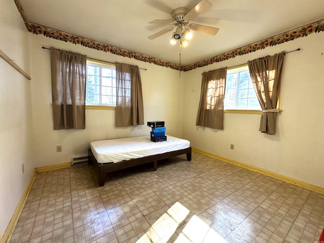 unfurnished bedroom featuring ceiling fan