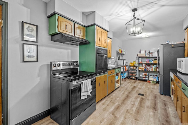 kitchen featuring green cabinets, pendant lighting, stainless steel appliances, and light wood-type flooring