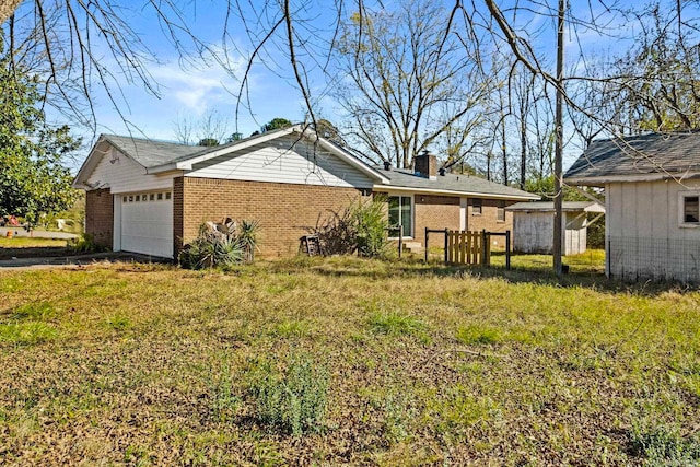 view of side of property with a garage