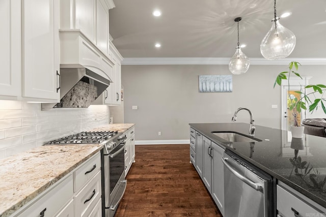 kitchen featuring dark hardwood / wood-style floors, sink, white cabinetry, and stainless steel appliances