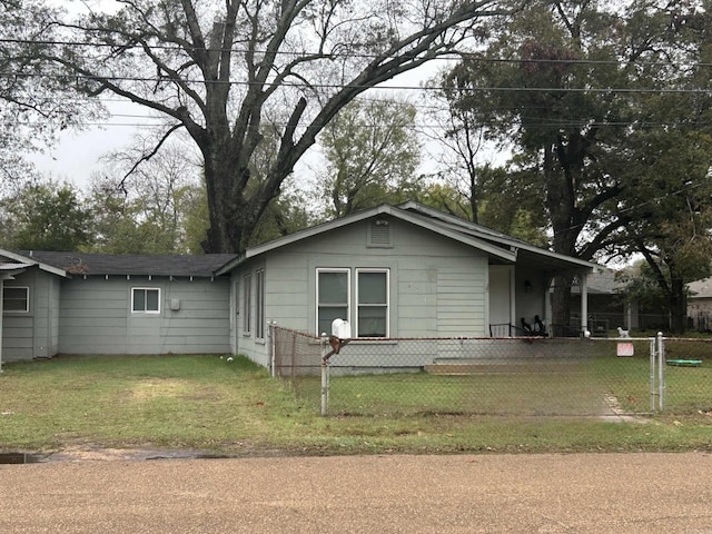 view of property exterior featuring a lawn