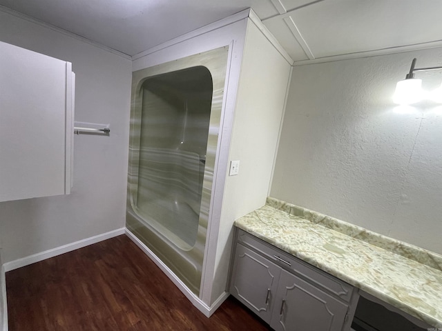 bathroom with hardwood / wood-style flooring