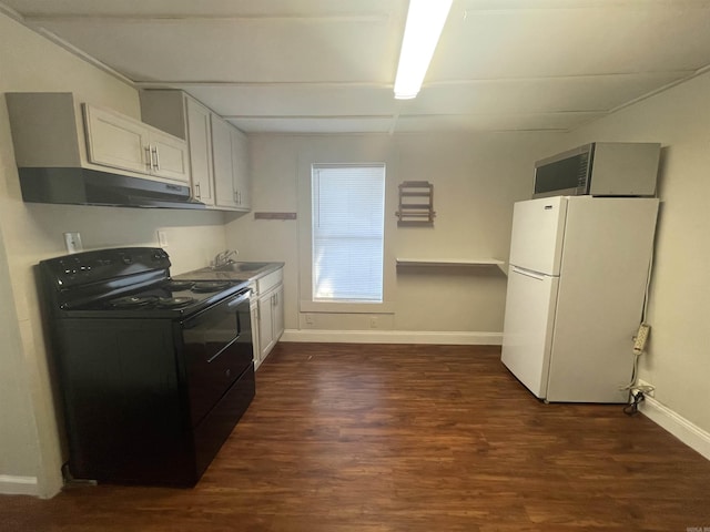 kitchen featuring black electric range oven, white cabinets, sink, dark hardwood / wood-style floors, and white fridge