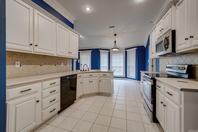 kitchen featuring kitchen peninsula, stainless steel appliances, hanging light fixtures, and ornamental molding