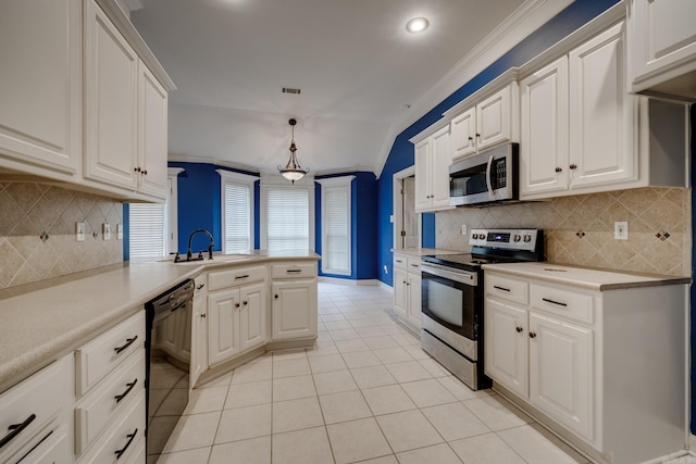 kitchen with crown molding, decorative backsplash, decorative light fixtures, kitchen peninsula, and stainless steel appliances