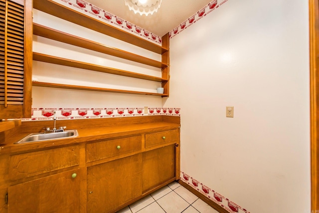 bathroom featuring tile patterned floors and vanity