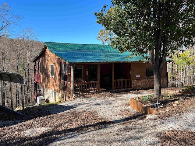 1217 Lovell Ln, Mountain View, AR 72560 - view of front of property with covered porch and metal roof