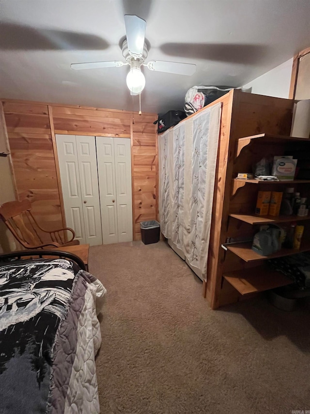 bedroom with carpet, a closet, and ceiling fan